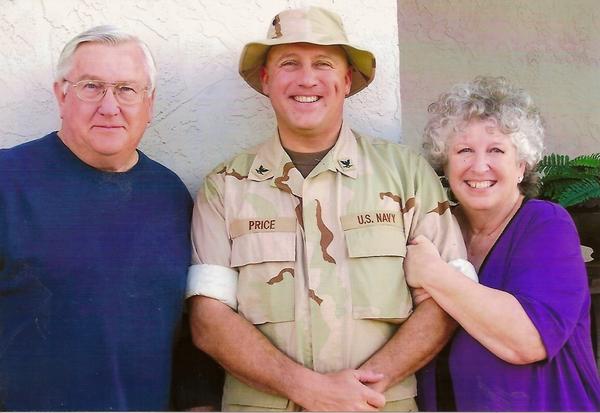 David and parents pose together during his days in the Navy.