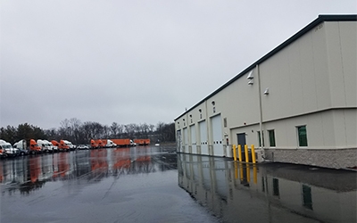 Schneider company trucks line the parking lot of the Shrewsbury location.