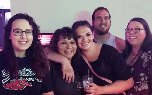 Dawn Habeck poses with her three daughters and one son.