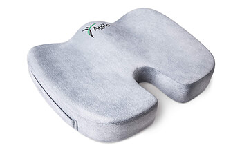 The Aylio Coccyx Orthopedic Comfort Foam Seat Cushion is a U-shaped, grey cushion that has curves to conform to the user’s bottom.