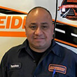 Headshot of Francisco in a Schneider diesel shop