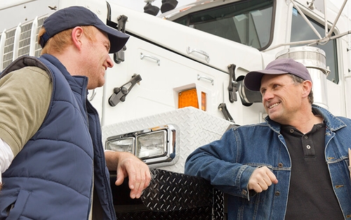 A Schneider company driver refers a fellow truck driver for the change to earn a referral bonus.