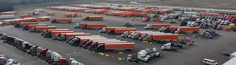 Schneider trailers and trucks parked at one of the company's nationwide driver facilities.