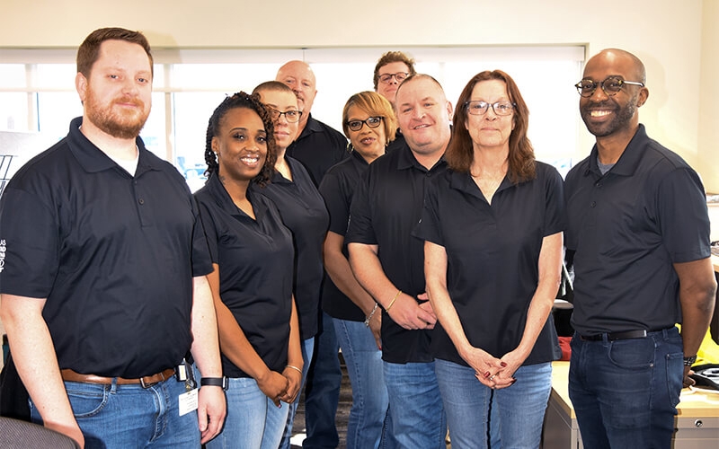 Schneider associates gather to welcome drivers at the new Dallas facility.