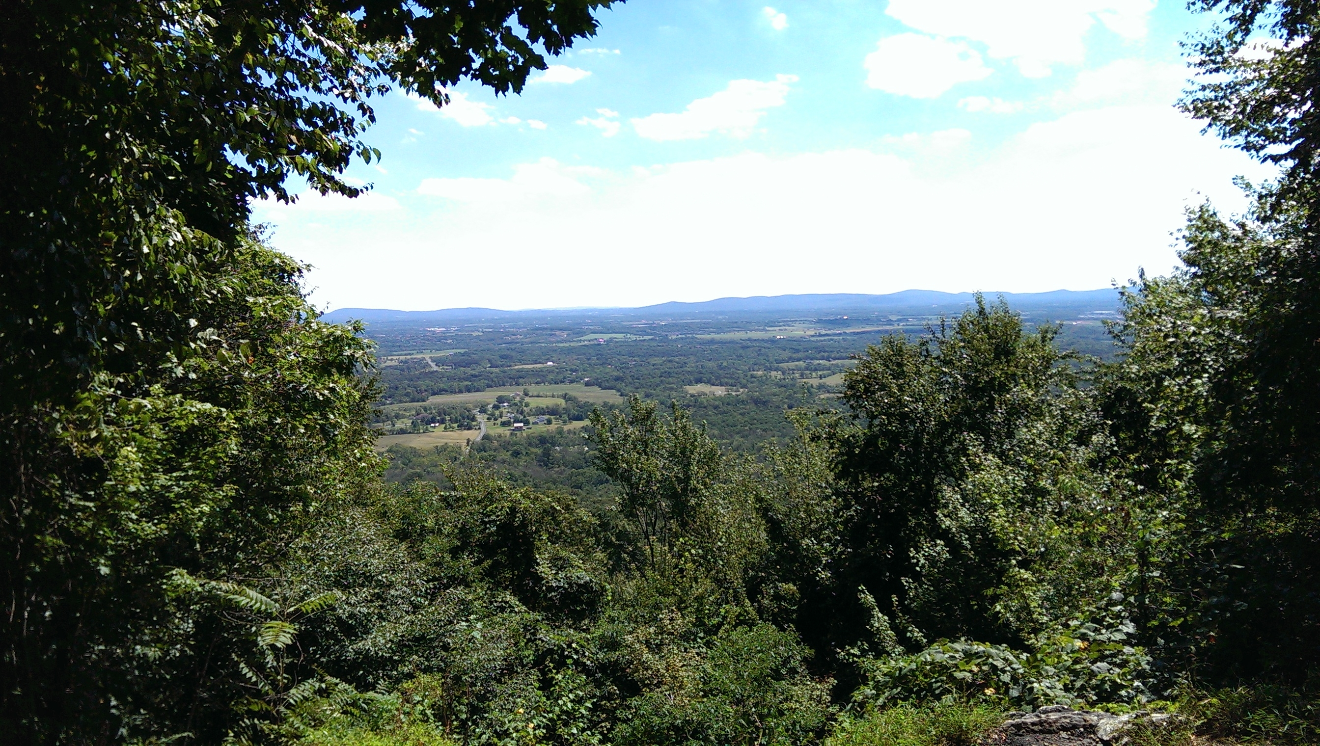 A nature overlook shows miles of rural landscape.