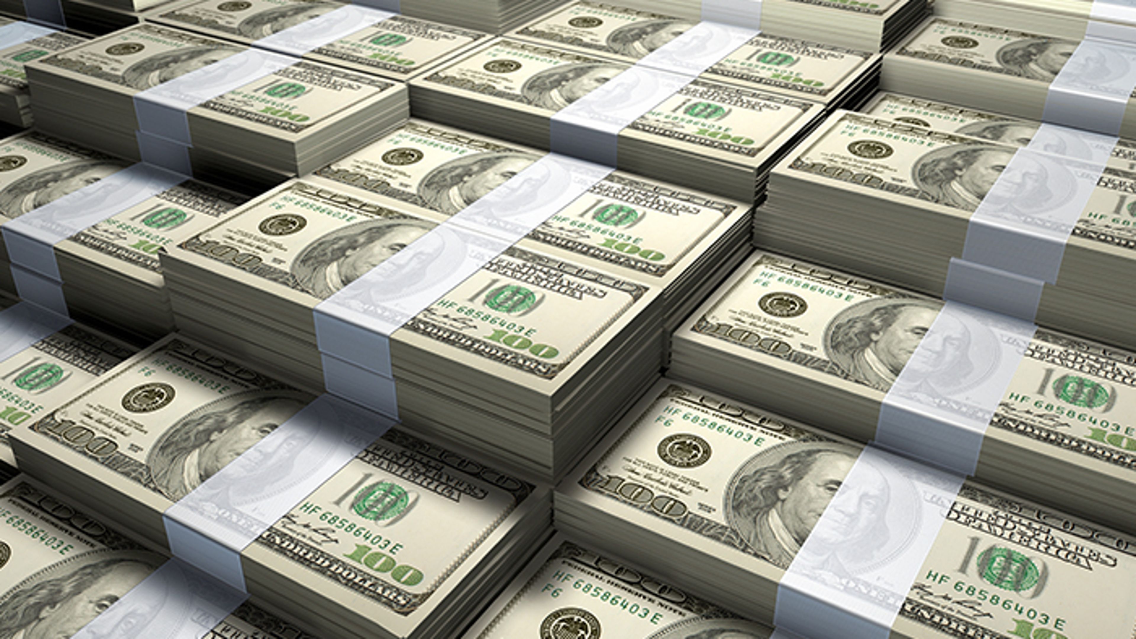Stacks of hundred dollar bills