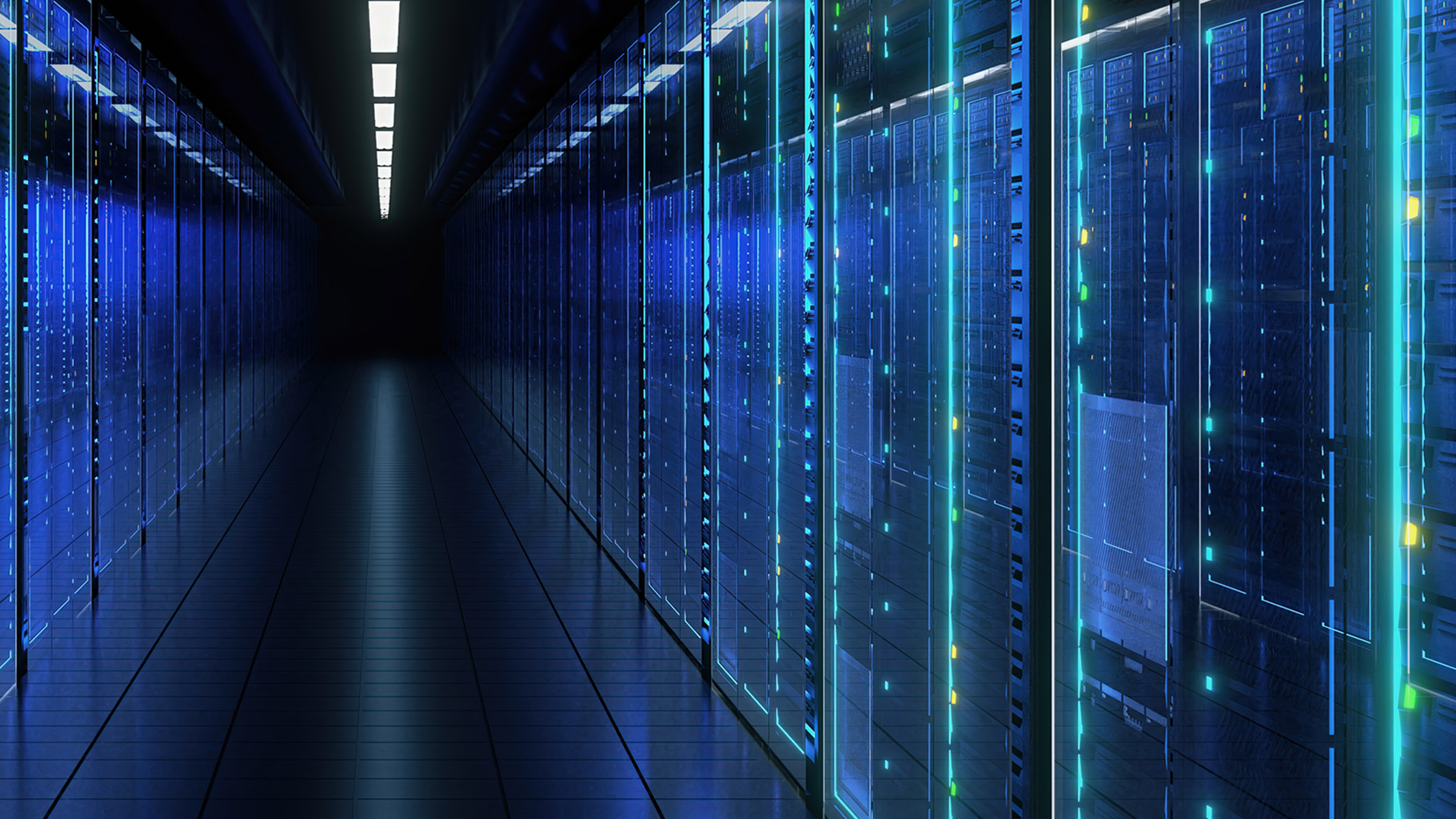 Interior view of a data center corridor with rows of server racks and blue lighting reflecting off polished floors, showing cables and equipment along both sides