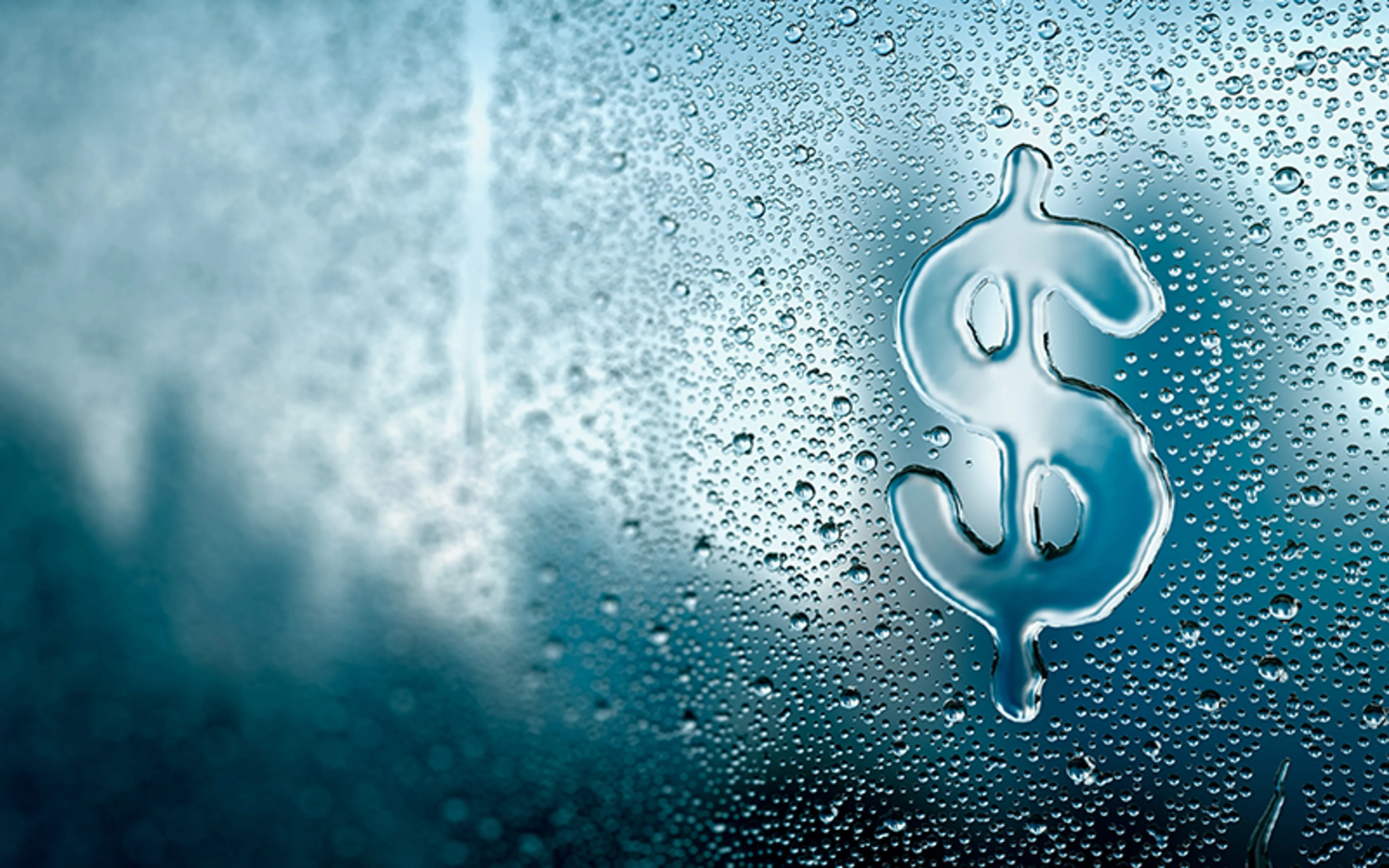 Dollar sign created out of water droplets