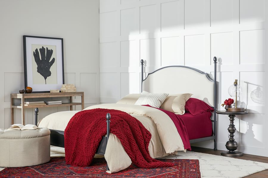White Bed with Red Bedding