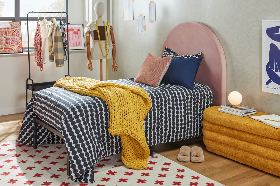 Bed with Knit Blanket