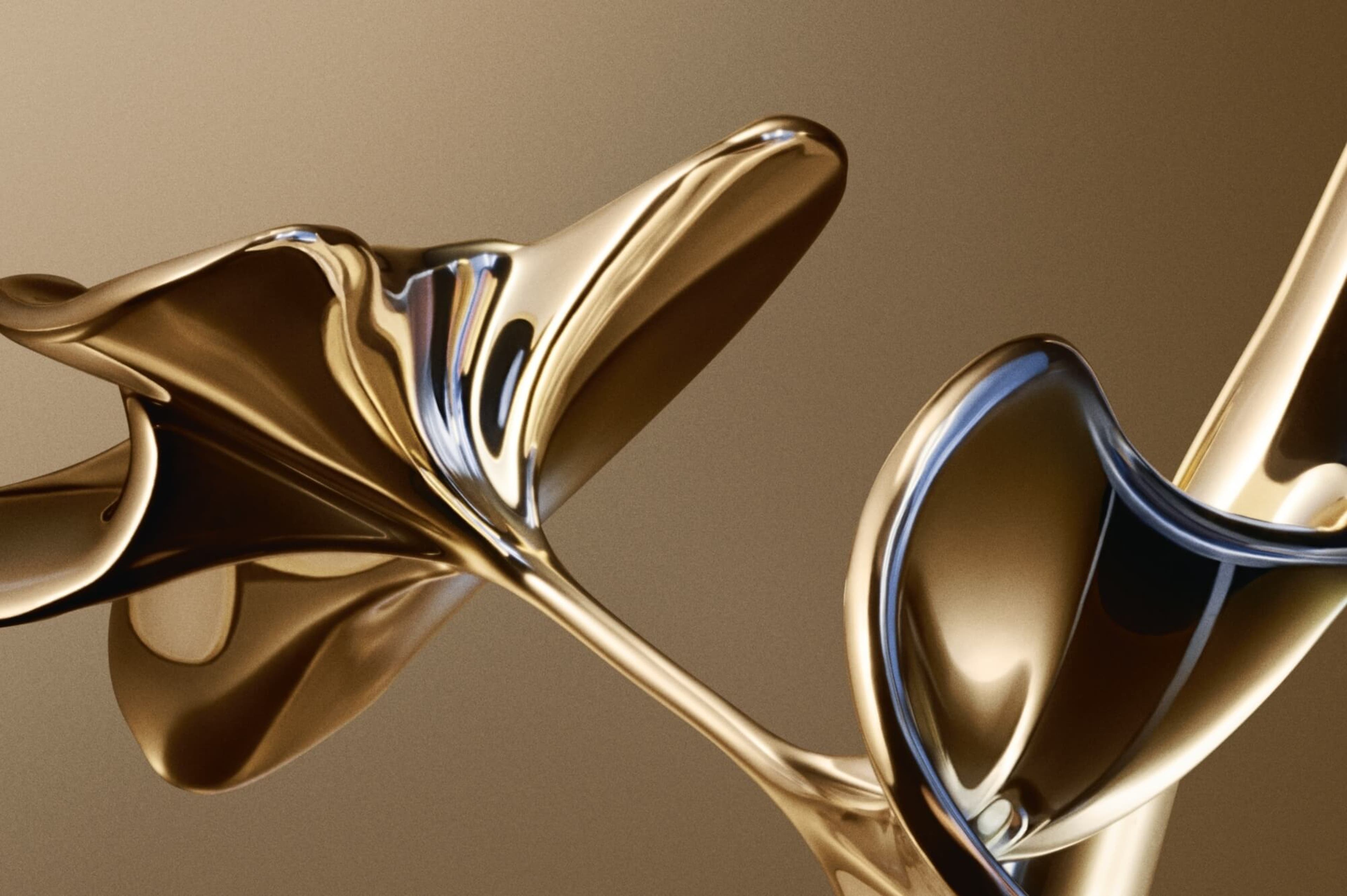 Abstract gold liquid shapes with reflective surfaces on a beige background