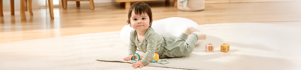 Mother with young child in 4Baby Romper