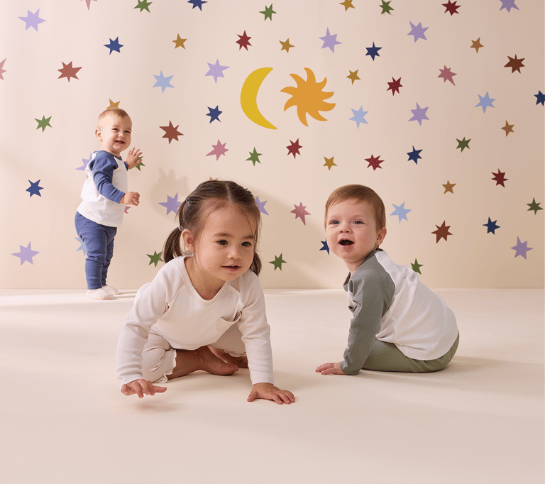 Mother with young child in 4Baby Romper