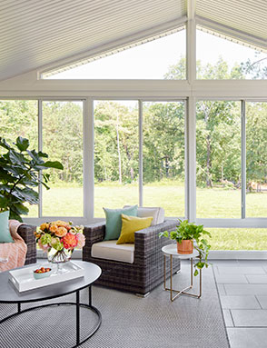 floor-to-ceiling glass sunroom windows