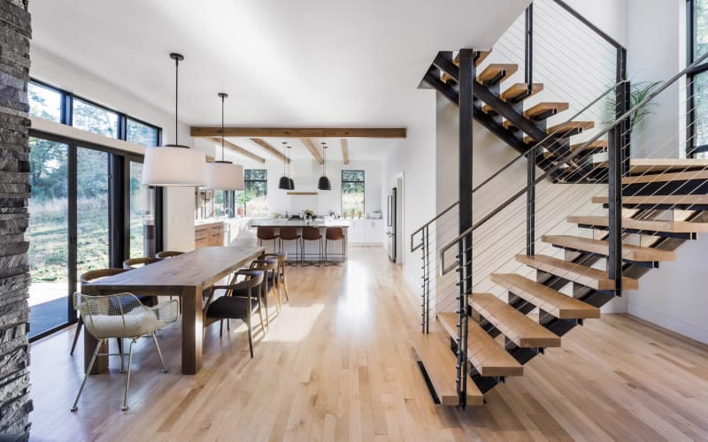 contemporary kitchen with open staircase