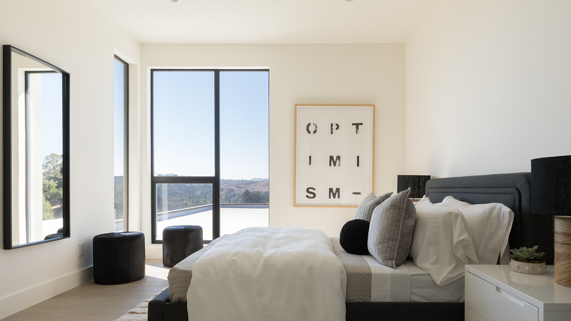 Lucas Ranch home bedroom with black and white decor