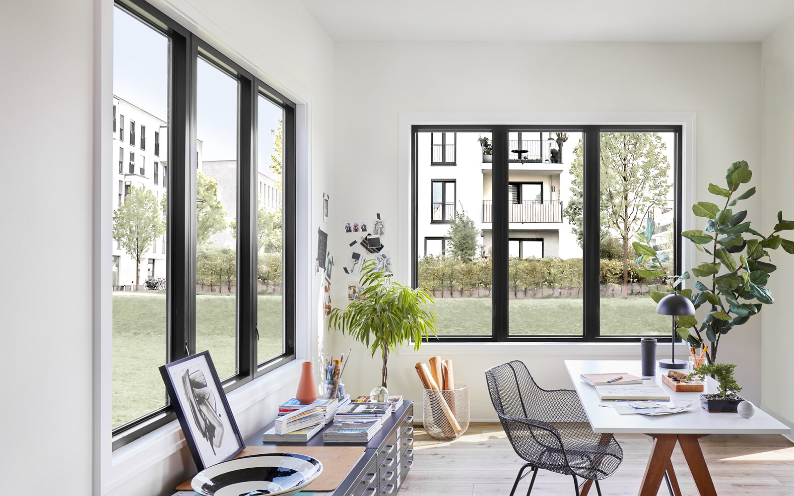 two sections of black fiberglass windows