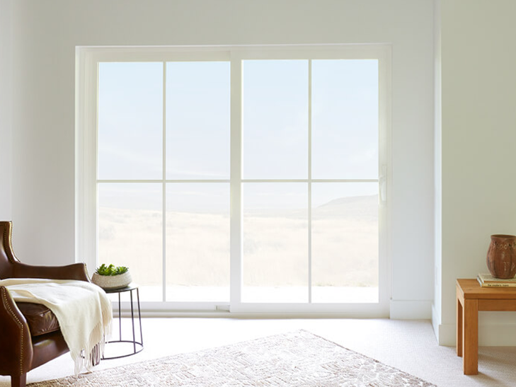 cream-color sliding doors on a matching cream wall