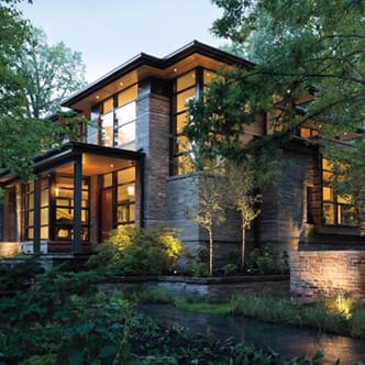 a contemporary home with floor-to-ceiling windows