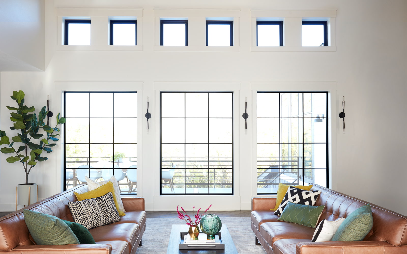 three large fixed fiberglass windows with six fixed windows spanning overhead