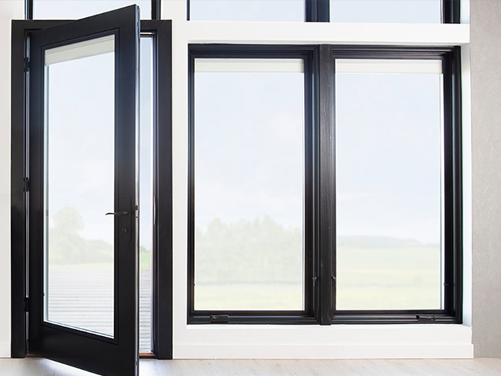 a single black hinged door aside tall casement windows