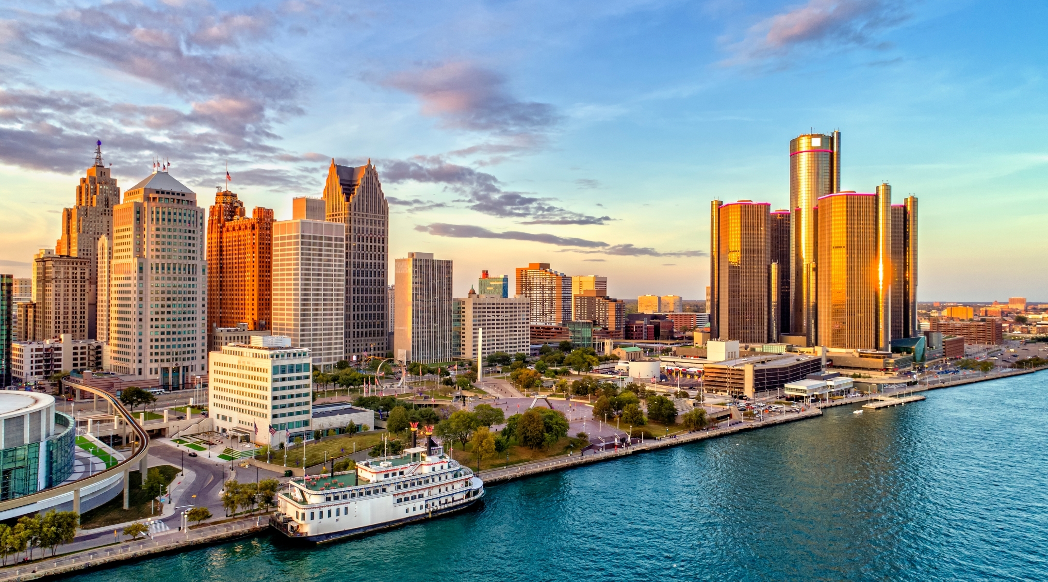 Afternoon view of downtown across a river in Michigan