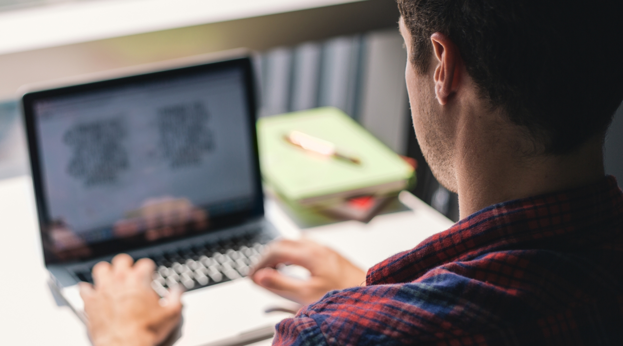 Customer researching debt consolidation loans on a laptop