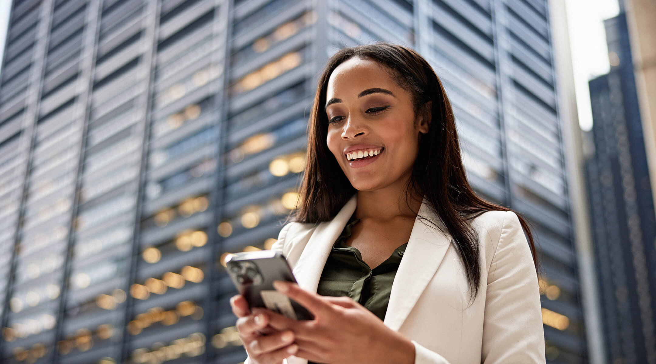 Woman on her phone in downtown