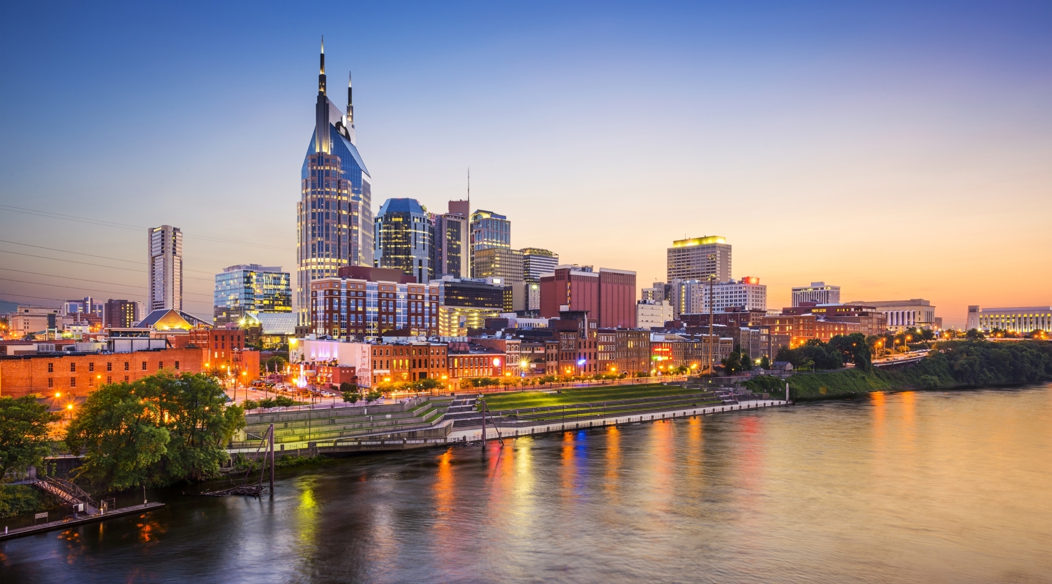 Evening view of downtown across a river in Tennessee