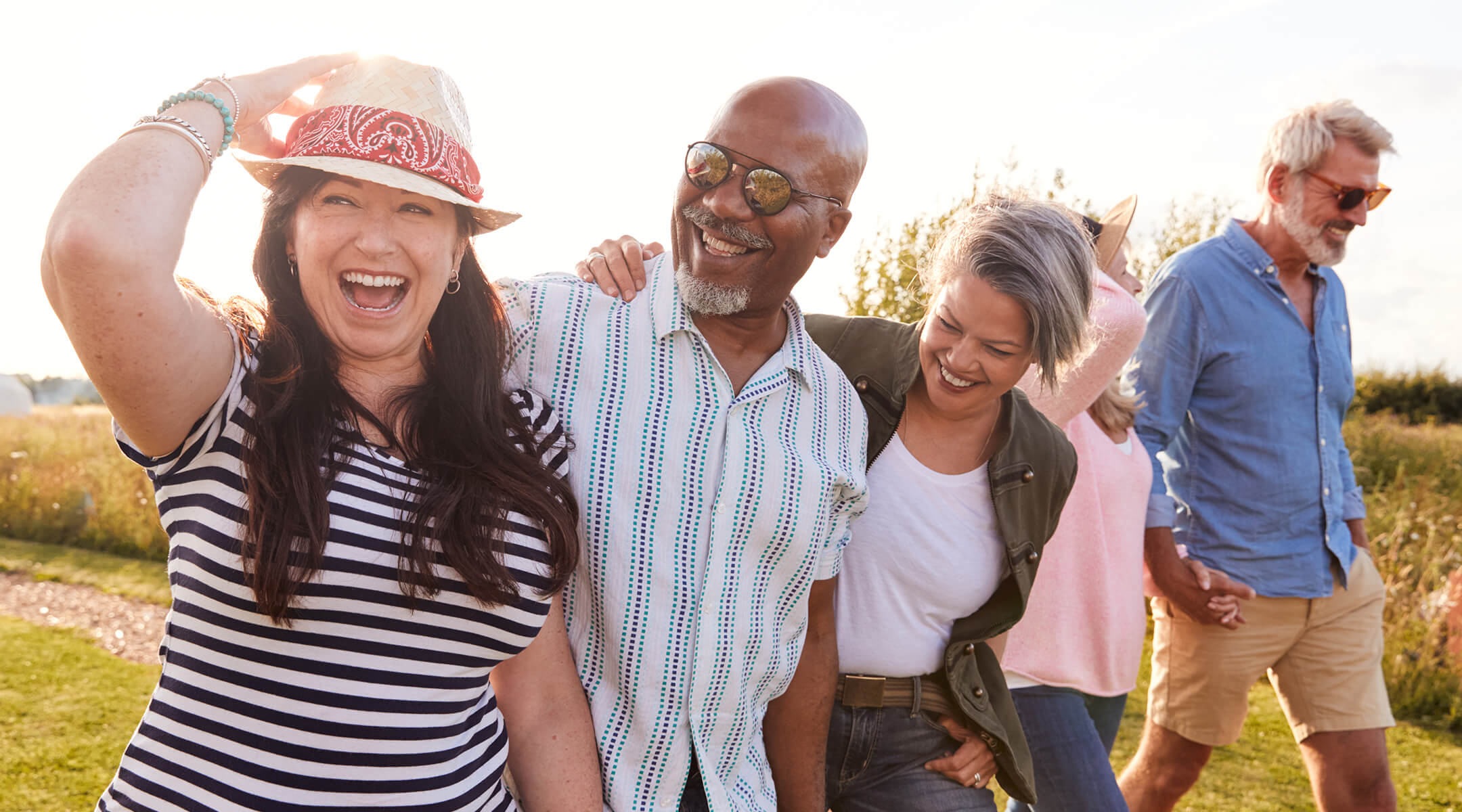 Friends in a group laughing together