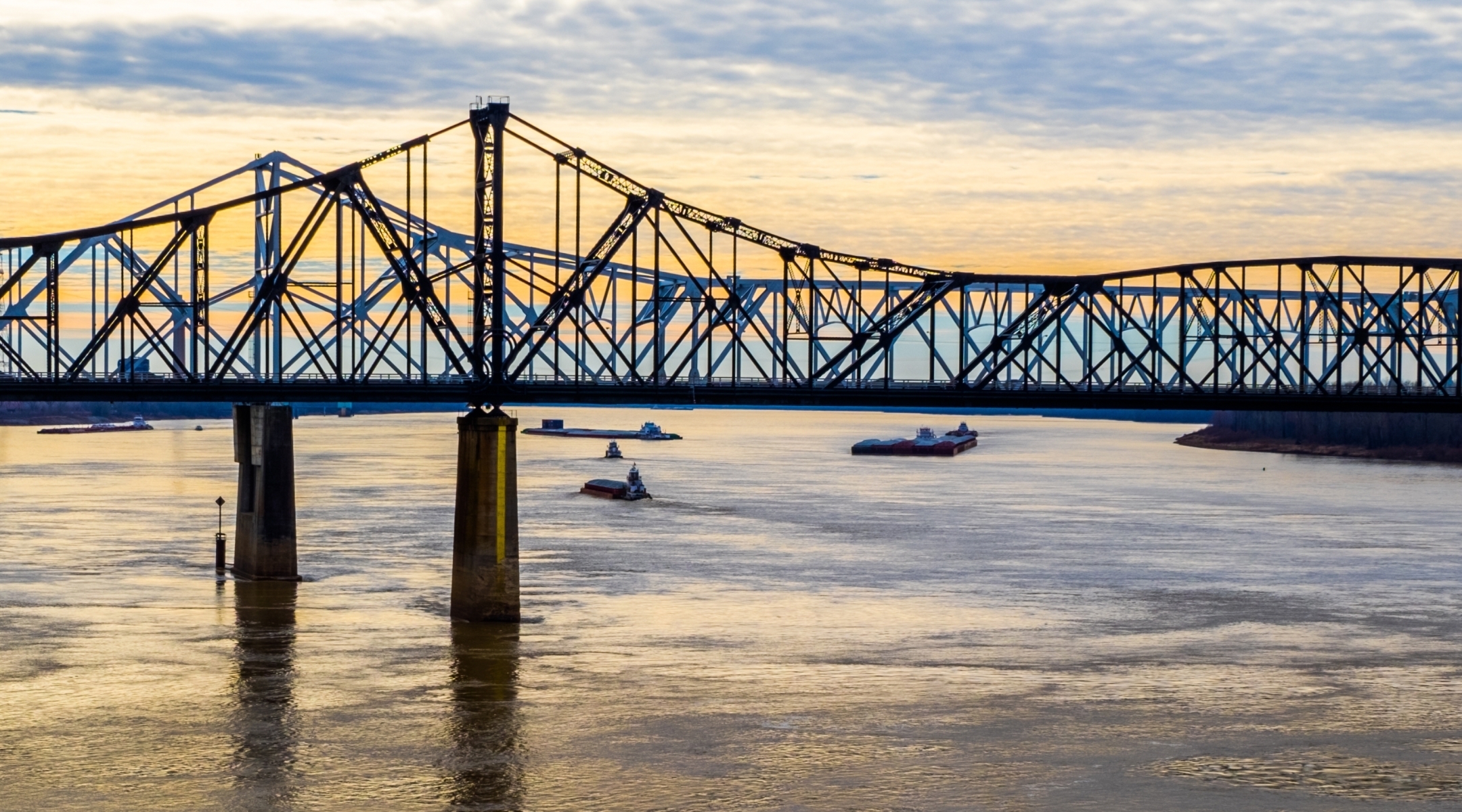 Evening view of a bridge across a river in Mississippi