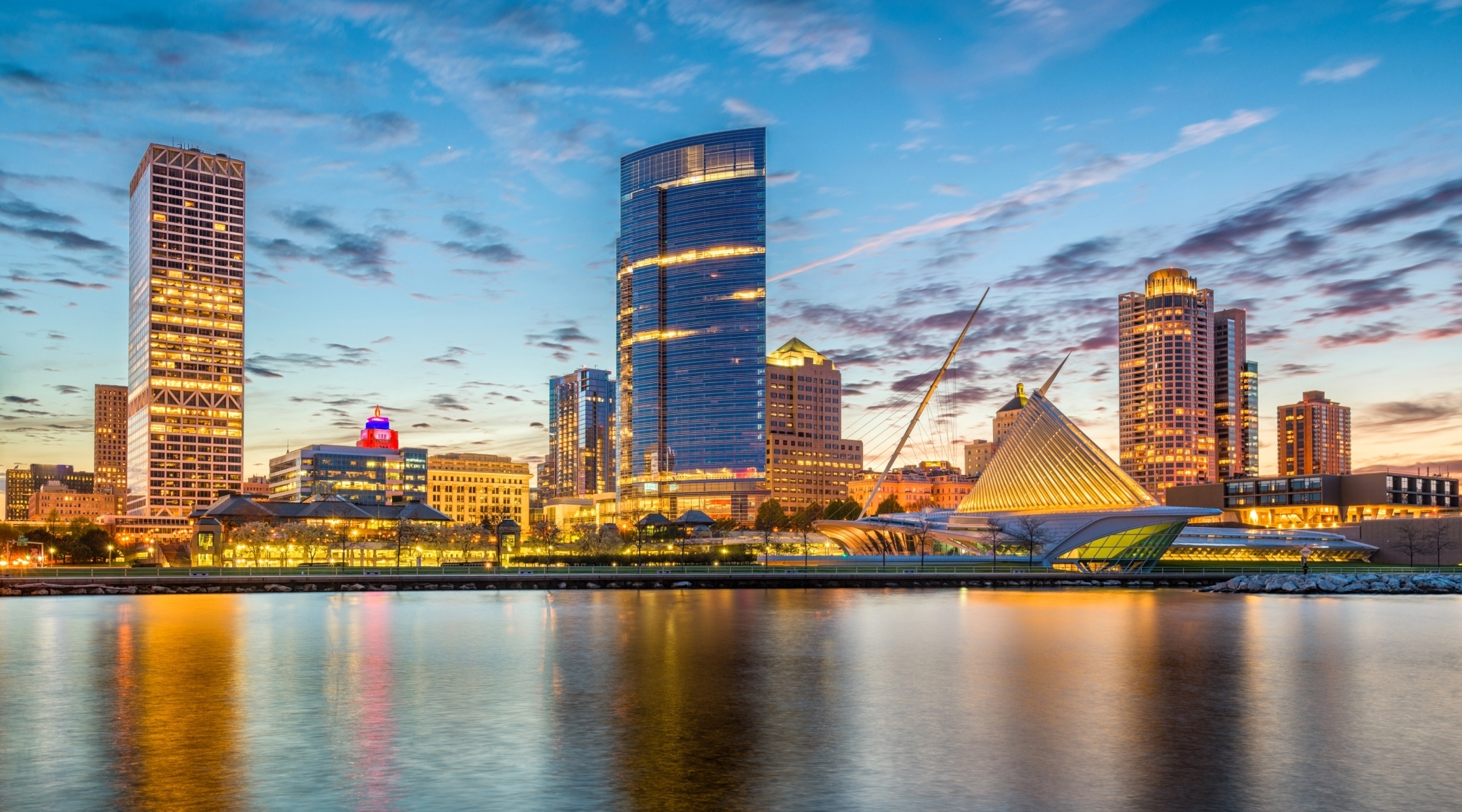 Evening view of downtown across a river in Wisconsin