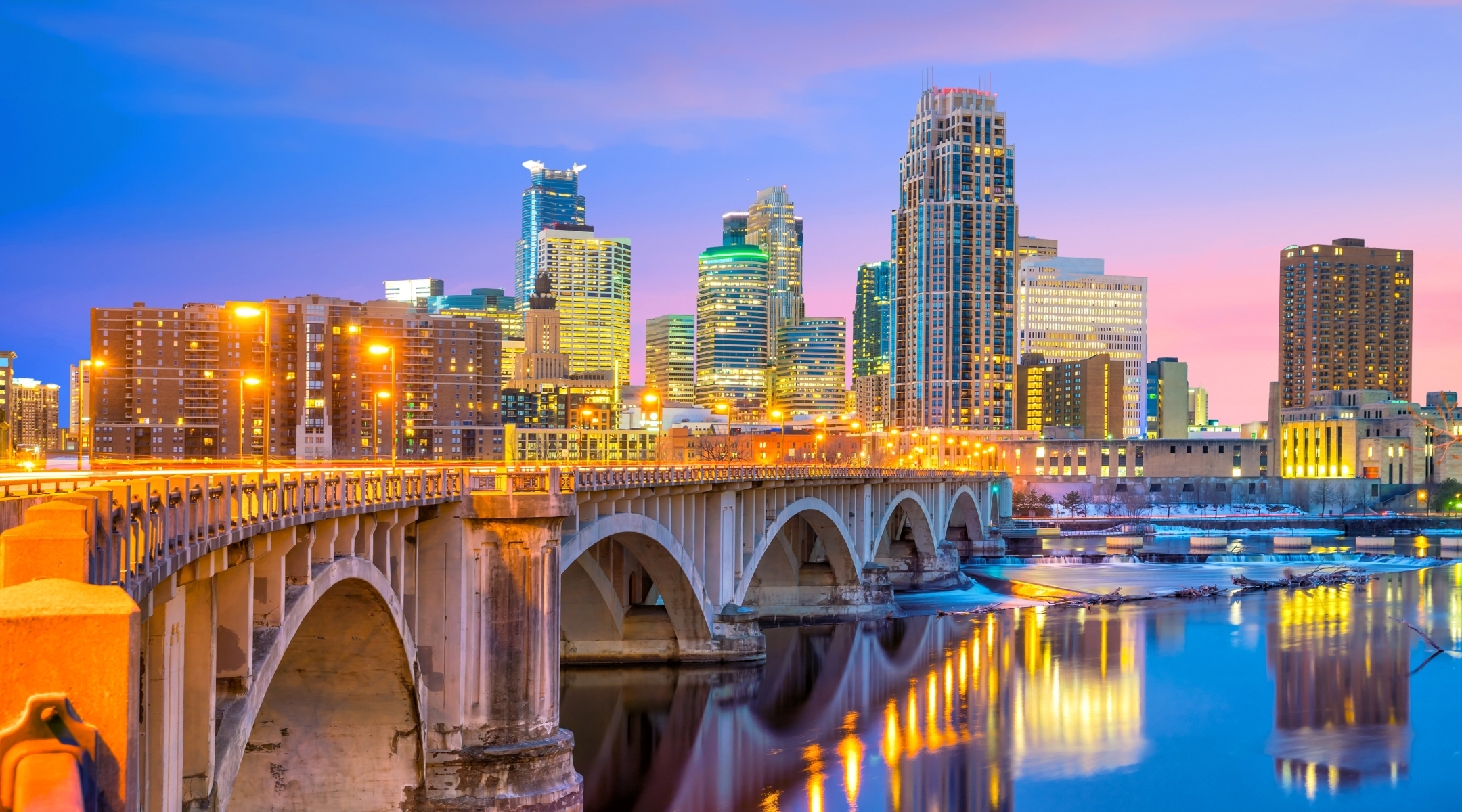 Evening view of downtown looking across a bridge in Minnesota