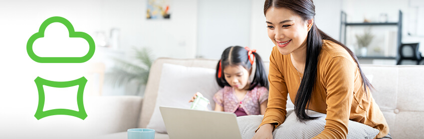 Woman sitting with laptop