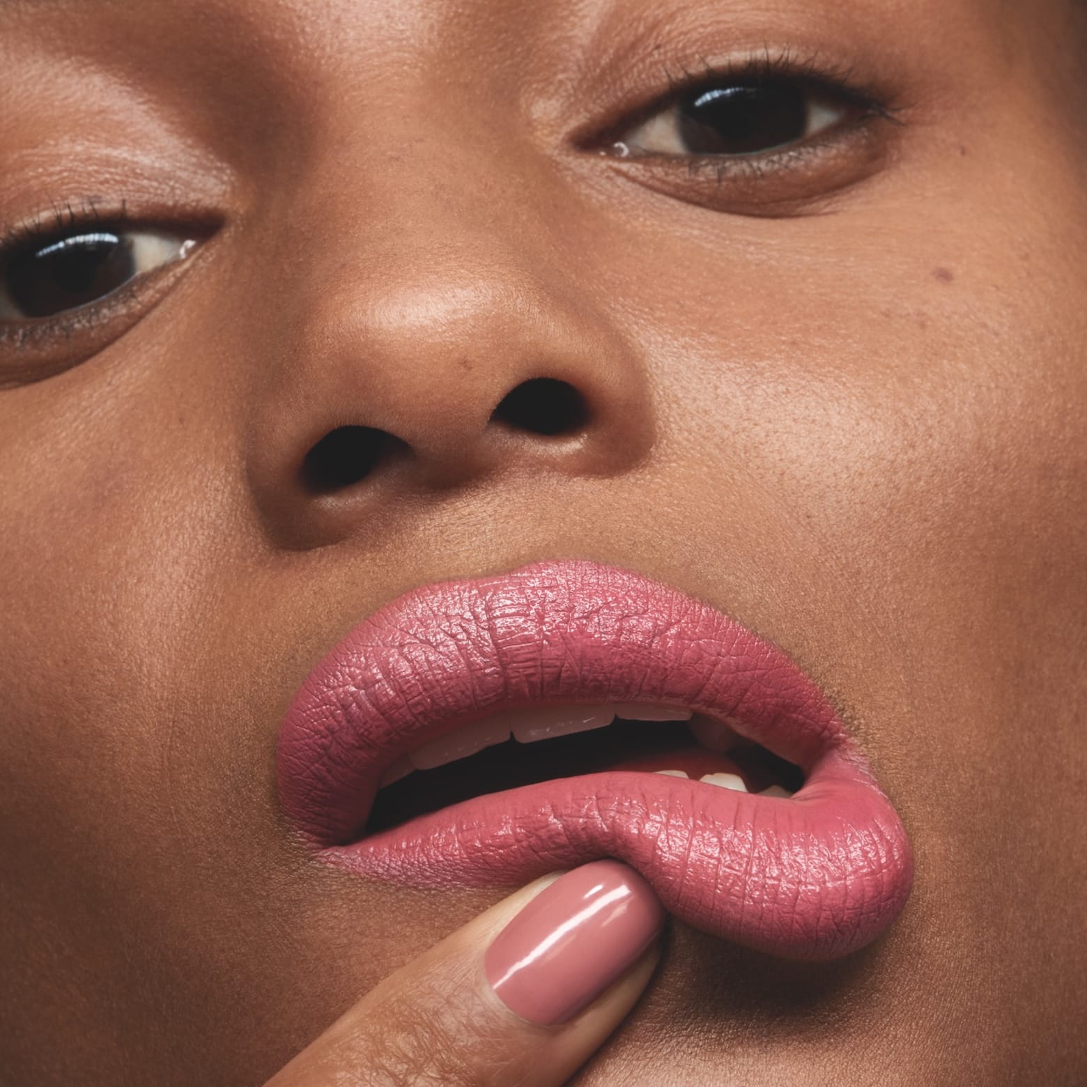 peach lip gloss for dark skin