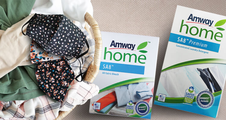 750_shot_of_Amway_SA8_laundry_products_beside_basket_of_clothes_and_reusable_face_masks.jpg