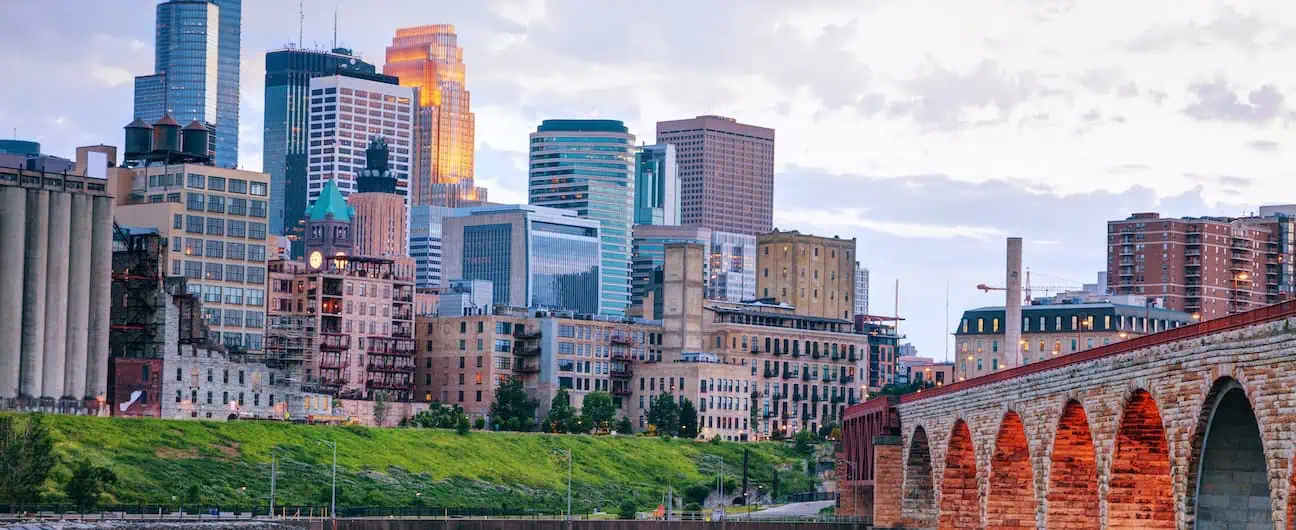 A view of Minneapolis, MN's downtown skyline in the evening 