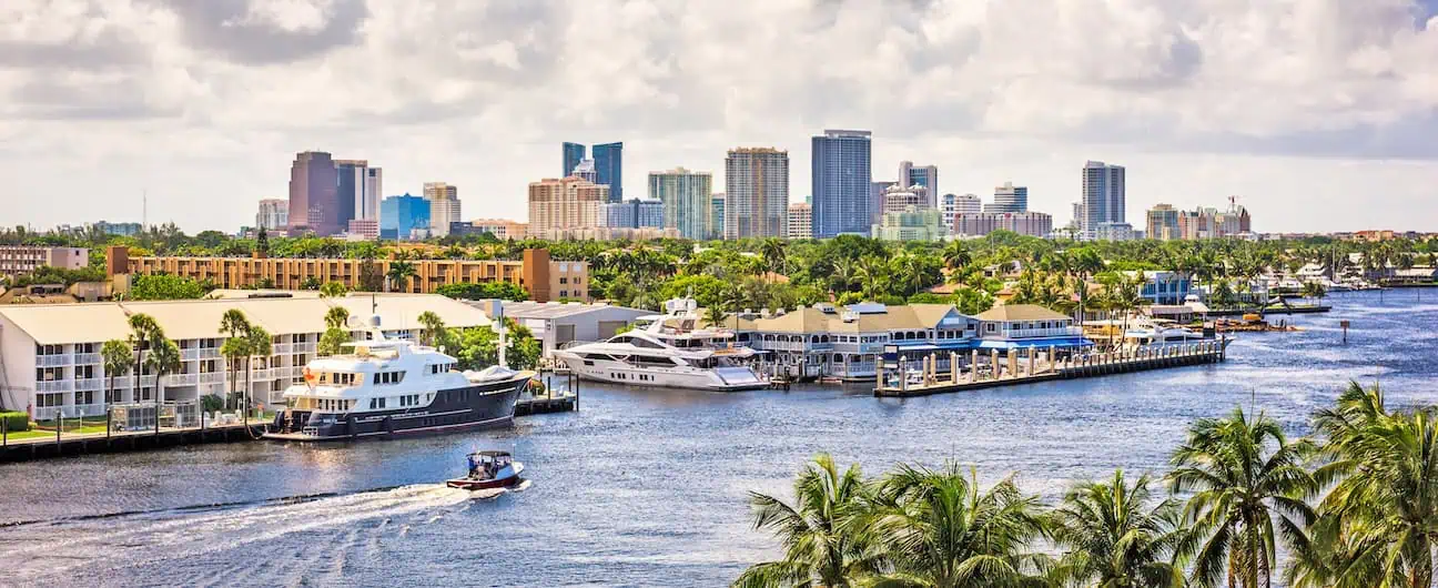 A view of the waterfront, marina, and skyline of Fort Lauderdale, FL