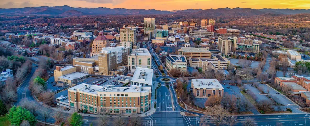 An aerial view of Asheville, NC at sunset 