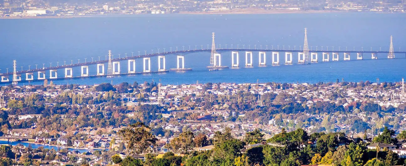 A view of the San Mateo bridge and nearby homes in San Mateo county California