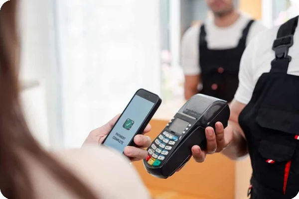 A customer pays movers with a phone app