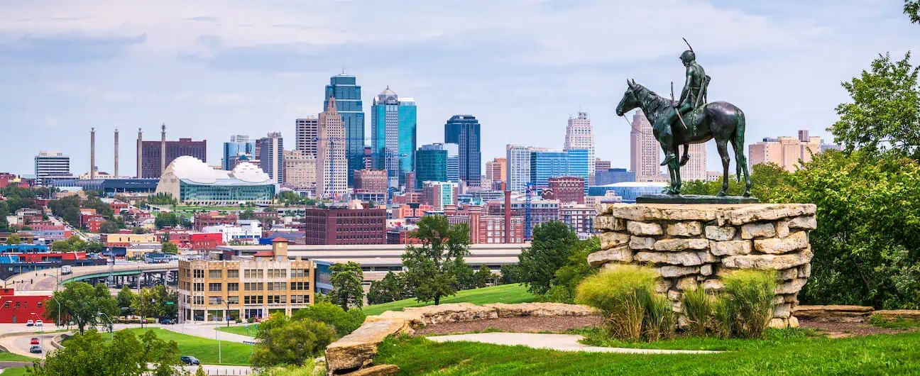 A view of Kansas City, MO's skyline from a hilltop