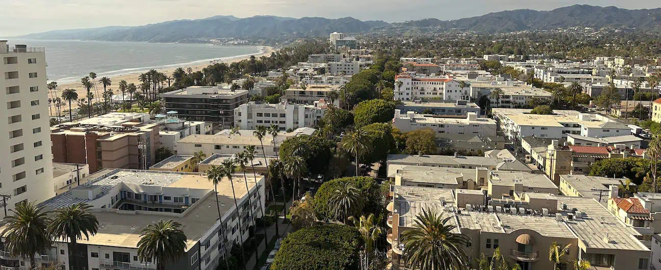 A view of the beach and waterfront homes in Santa Monica, CA