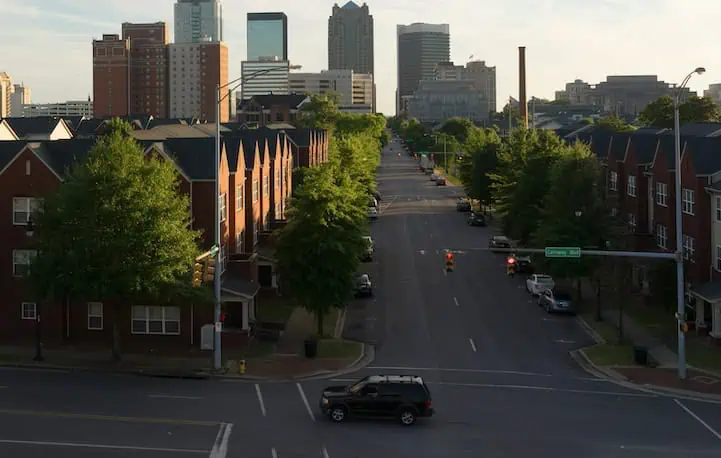 A neighborhood in Birmingham, AL with the downtown skyline in the background