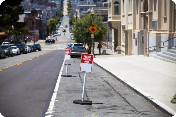parking permit signs set for a moving truck on a street