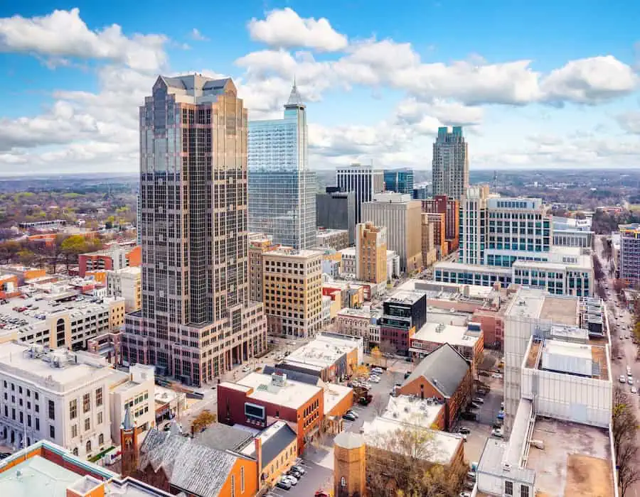 Aerial view of Raleigh, North Carolina skyline on a sunny day.