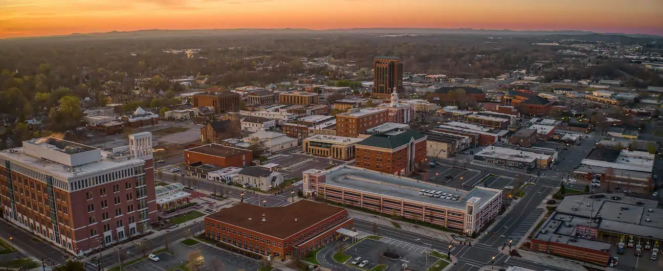 An aerial view of Murfreesboro, TN's neighborhoods and suburbs at sunset