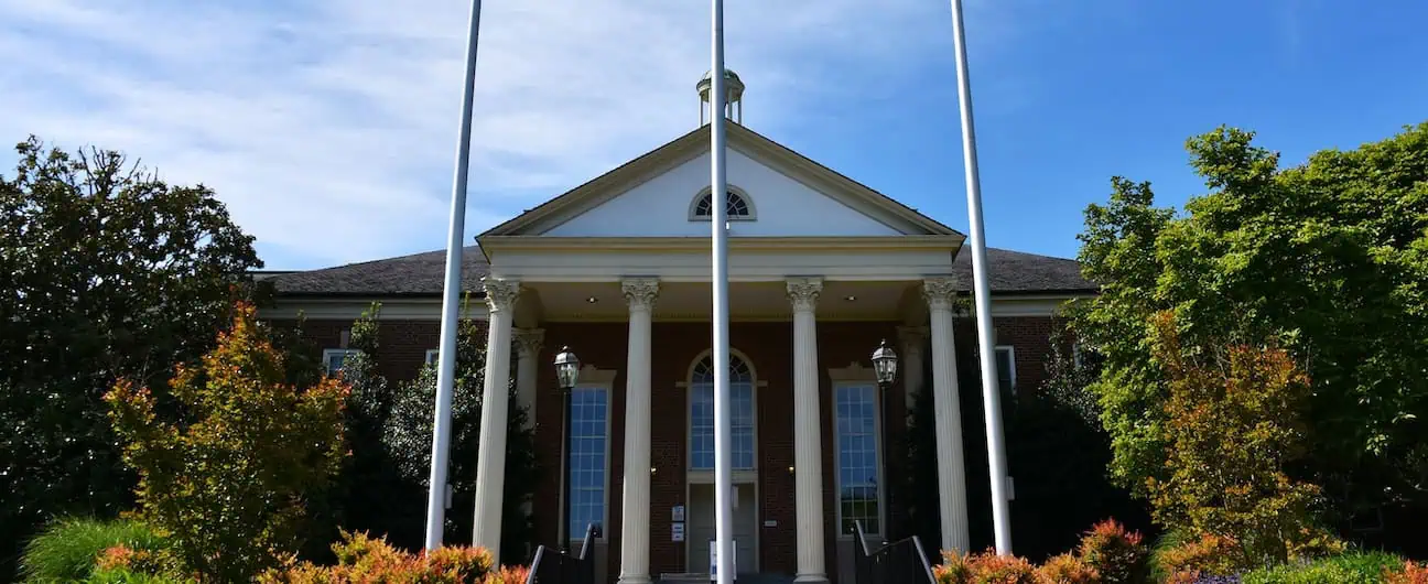 A view of the front of city hall in Fairfax, VA