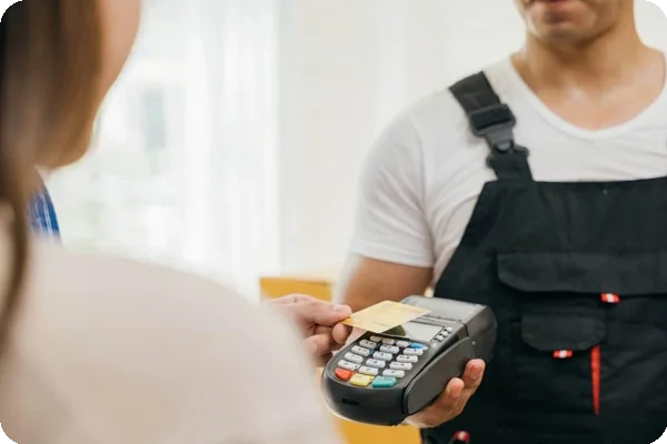 someone uses a credit card to pay movers