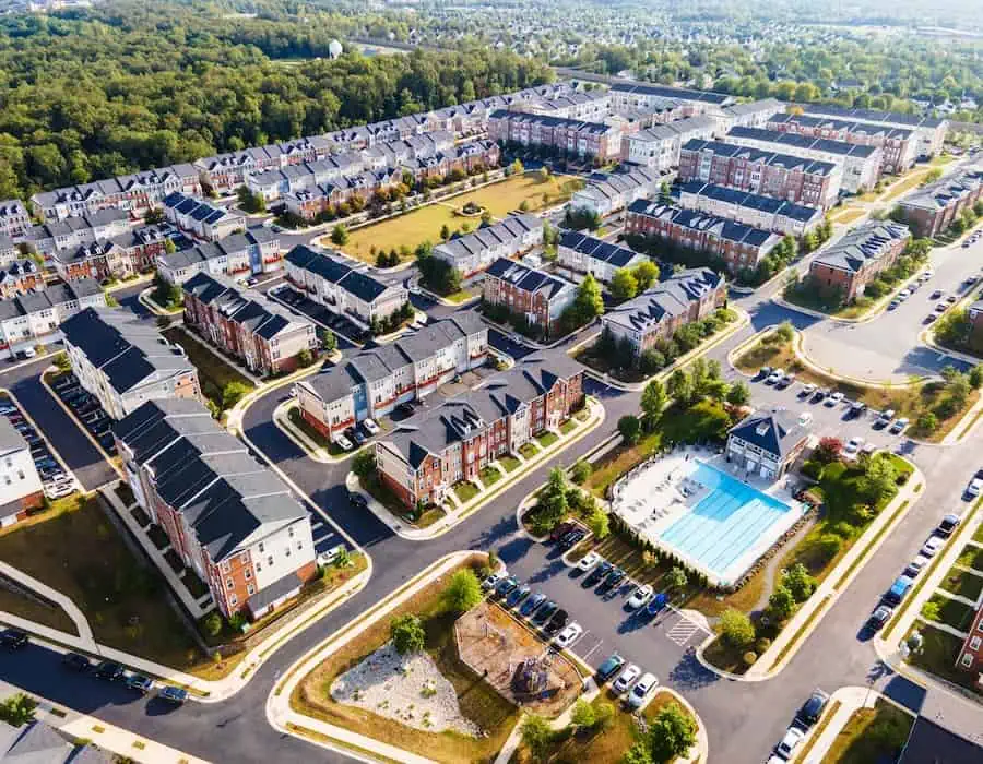 Top-down aerial view of urban houses and streets in a residential area of Ashburn, Virginia.